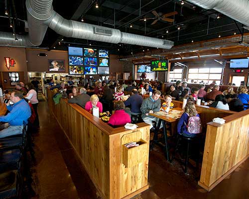 Double Dogs Hardin Valley interior with big TVs.